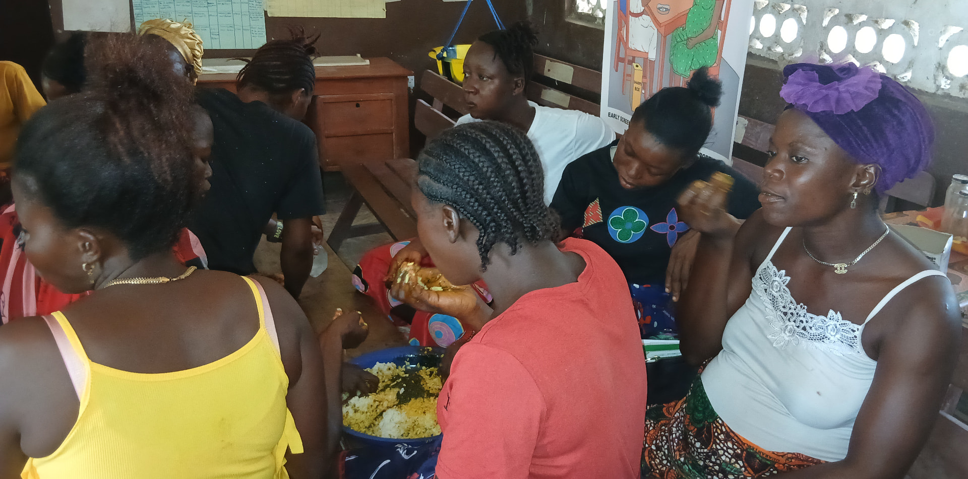 Women gathered together during a shared community meal